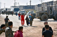 Evacuees from the two rebel-besieged Shi'ite villages of al-Foua and Kefraya, arrive to government-controlled Aleppo, in this handout picture provided by SANA on April 19, 2017, Syria. SANA/Handout via REUTERS