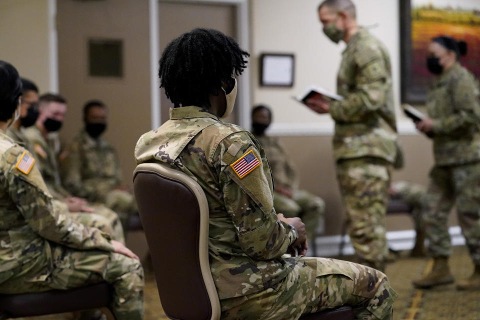 Soldiers give feedback to Sergeant Major of the Army Michael Grinston, second from right, and Sgt. Maj. Julie Guerra, People First Task Force, right, about their concerns at Fort Hood, Texas, Thursday, Jan. 7, 2021. Following more than two dozen soldier deaths in 2020, including multiple homicides, the U.S. Army Base is facing an issue of distrust among soldiers. (AP Photo/Eric Gay)