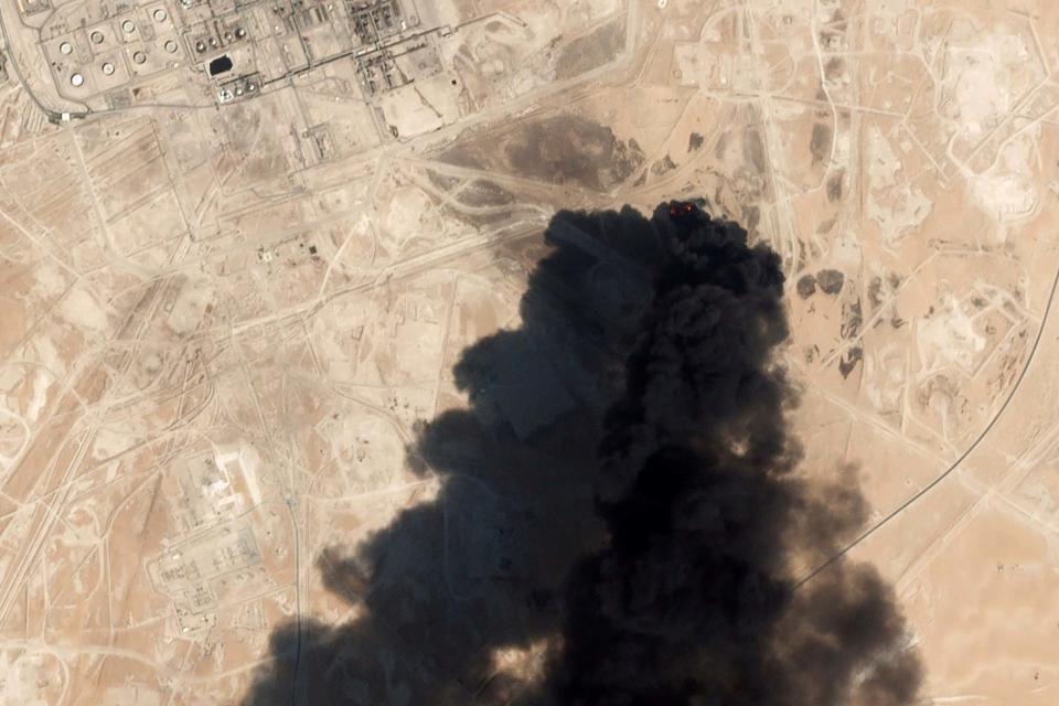 Thick black smoke rising from Saudi Aramco's Abqaiq oil processing facility in Buqyaq (AP)