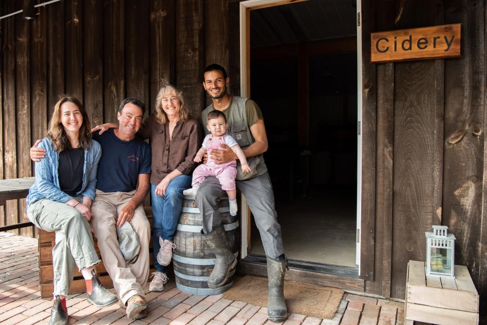 Manoff Market Cidery is a family-run business at Manoff Market Gardens, a 35-acre farm located on Comfort Road in Solebury Township. Pictured are owners, Gary and Amy Manoff, center; with their daughter, Chelsea Manoff, left; son-in-law, Maher Alazzeh right; and grandaughter, Rumi Alazzeh.