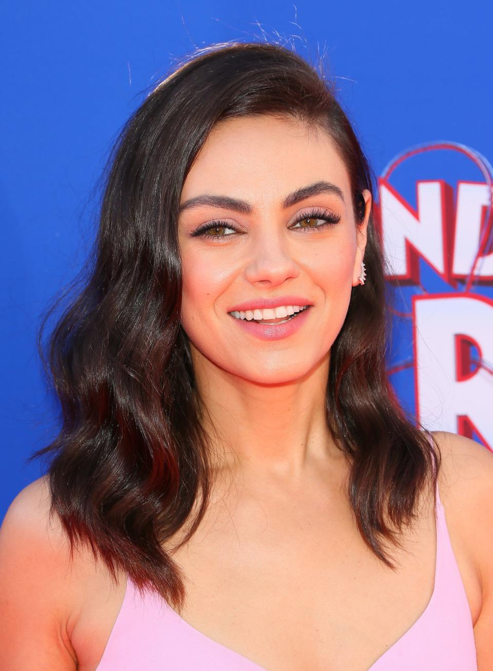 Mila Kunis Is Completely Unrecognizable With Blonde and Blue Hair