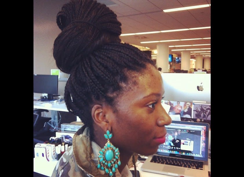 We're obsessed with beauty editor Dana Oliver's earrings (and towering topknot).