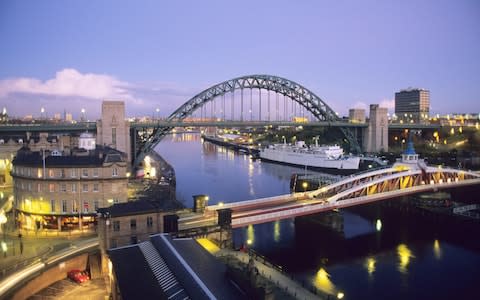 Newcastle Sway Bridge at night time - Credit: Rich LaSalle/Getty Images