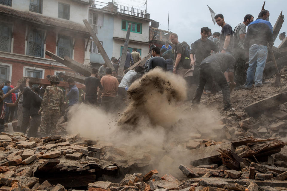 Strong earthquake and aftershocks shake Nepal A powerful earthquake struck Nepal Saturday, killing at least 1,180 people across a swath of four countries as the violently shaking earth collapsed houses, leveled centuries-old temples and triggered avalanches on Mt. Everest. It was the worst tremor to hit the poor South Asian nation in over 80 years. At least 1,130 people were confirmed dead across Nepal, according to the police. Another 34 were killed in India, 12 in Tibet and two in Bangladesh. Two Chinese citizens died in the Nepal-China border. The death toll is almost certain to rise, said deputy Inspector General of Police Komal Singh Bam. (AP) Photography by Omar Havana/Getty Images See more earthquake photos and our other slideshows on Yahoo News.