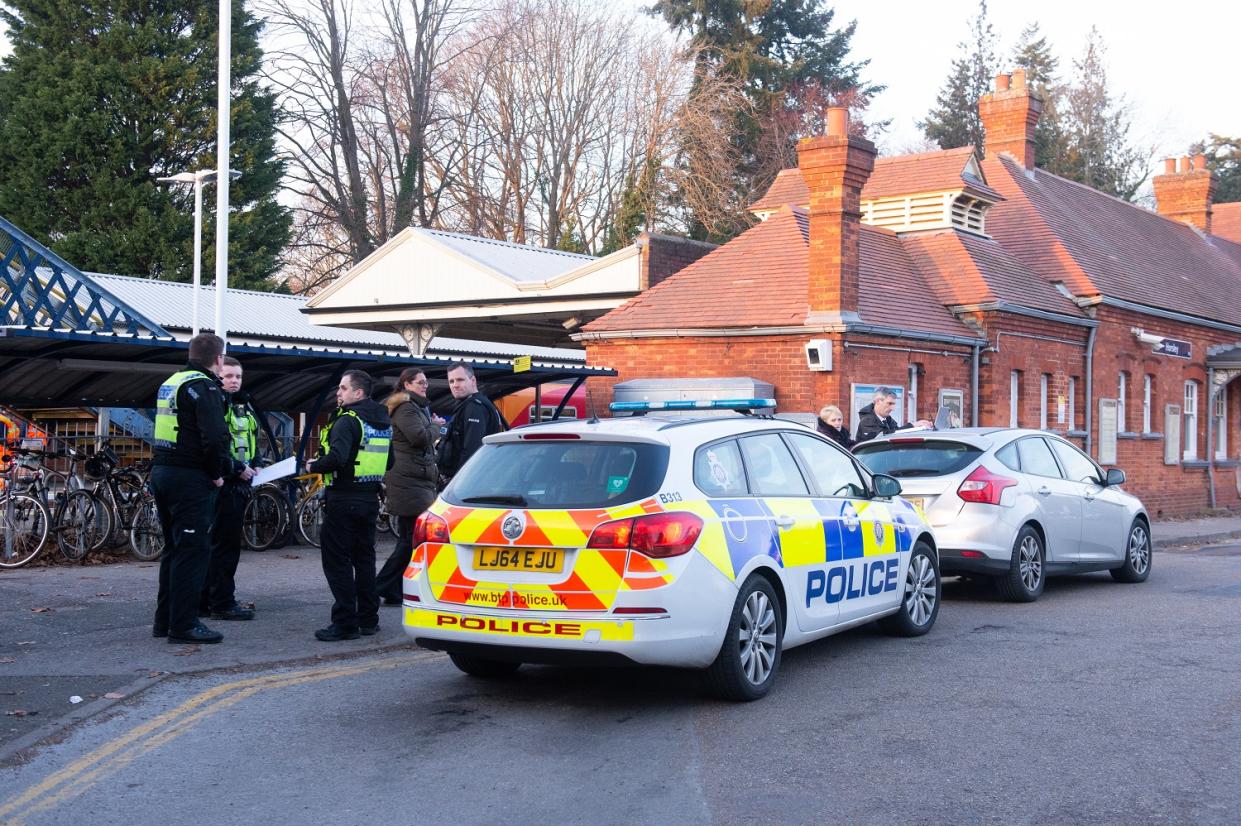 The scene at Horsley station, in Surrey, shortly after police and paramedics were called following a fatal stabbing onboard the 12.58pm service from Guildford to London Waterloo. (SWNS)