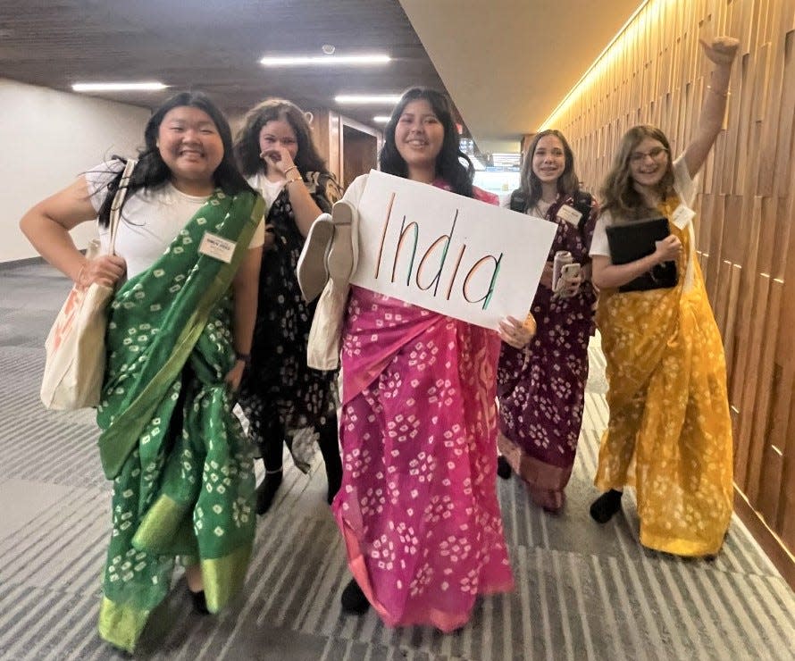 Members of team India, clad in traditional Indian apparel at the Ohio Model United Nations conference in Columbus are (not listed in order) Kaelyn Alvarado, LeeAnna Madison, Audrey Mast, McKelvey McFarland and Jevin Zheng.