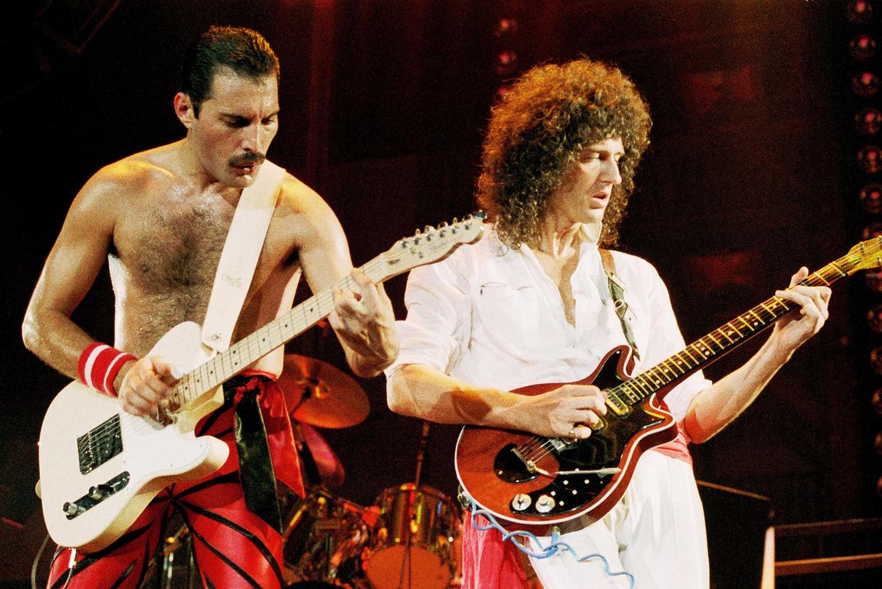 UNITED KINGDOM - SEPTEMBER 01:  WEMBLEY ARENA  Photo of QUEEN, Freddie Mercury and Brian May performing on stage  (Photo by Phil Dent/Redferns)