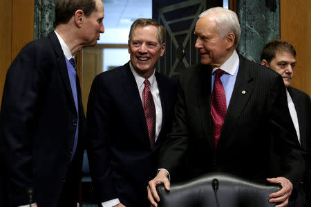 Robert Lighthizer (C) arrives at a Senate Finance Committee confirmation hearing on his nomination to be U.S. trade representative on Capitol Hill in Washington, U.S., March 14, 2017. REUTERS/Yuri Gripas