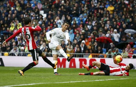 Football Soccer - Real Madrid v Athletic Bilbao - Spanish Liga BBVA - Santiago Bernabeu stadium, Madrid, Spain - 13/02/16 Real Madrid's Cristiano Ronaldo scores his second goal. REUTERS/Andrea Comas