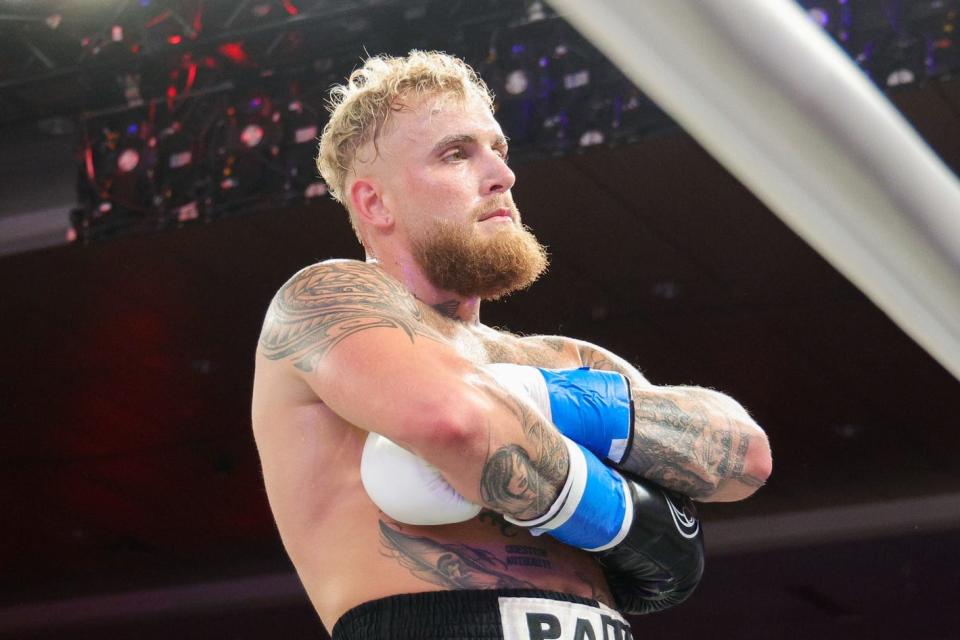 Dec 15, 2023; Orlando, Florida, USA; Jake Paul reacts after knocking out Andre August in the first round at Caribe Royale Orlando. Mandatory Credit: Nathan Ray Seebeck-USA TODAY Sports