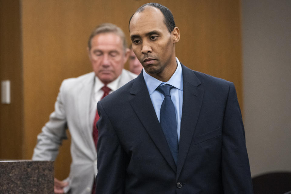 Former Minneapolis police officer Mohamed Noor walks to the podium to be sentenced at Hennepin County District Court Friday, June 7, 2019, in Minneapolis, before being sentenced by Judge Kathryn Quaintance in the fatal shooting of Justine Ruszczyk Damond. (Leila Navidi/Star Tribune via AP, Pool)