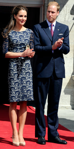 <b>Lady in lace </b><br><br> In our favourite fashion moment, Kate wore a dress by Montreal designer Erdem Moralioglu. The Cecile scoop-backed shift dress in stone crepe with a navy blue overlay featured sheer lace sleeves with scallop detail. We're in love.