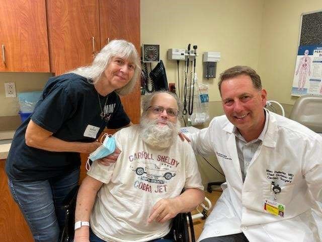 Jo Ann and Jon Misner of Hartville and Dr. Marc Pelletier, cardiac surgeon and director of the Heart Surgery Center at  University Hospital Cleveland Medical Center. Misner credits Pelletier and his team with saving his life.