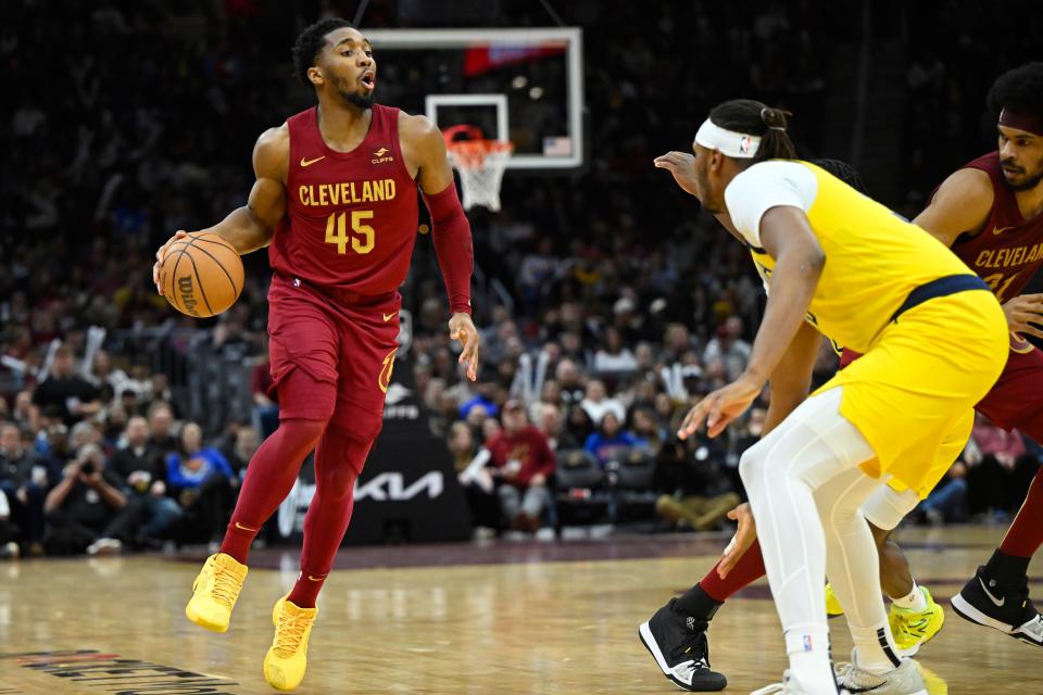 Apr 12, 2024; Cleveland, Ohio, USA; Cleveland Cavaliers guard Donovan Mitchell (45) brings the ball up court in the second quarter against the Indiana Pacers at Rocket Mortgage FieldHouse. Mandatory Credit: David Richard-USA TODAY Sports