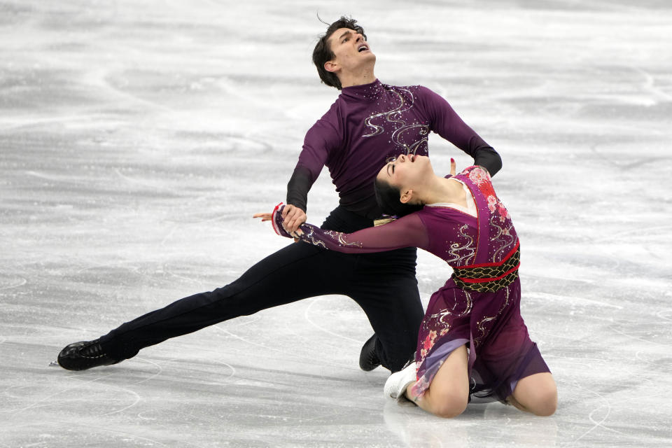 Misato Komatsubara and Takeru Komatsubara of Japan perform during ice dance free dance competition of the Japan Figure Skating Championships at Saitama Super Arena, in Saitama, north of Tokyo, Saturday, Dec. 25, 2021. (AP Photo/Eugene Hoshiko)
