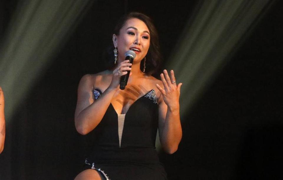 Top Five finalist Taylor Yamane (Miss Riverside City) answers a question during the 99th edition of the Miss California Pageant at the Visalia Convention Center on July 1, 2023.