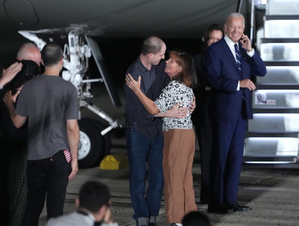 Evan Gershkovich hugging his mother Ella Milman at Joint Base Andrews.