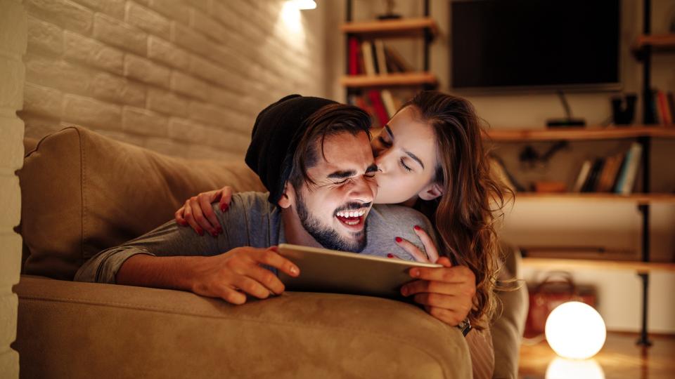 couple laughing together at home