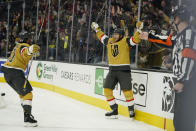 Vegas Golden Knights center William Karlsson, right, celebrates after scoring against the Montreal Canadiens during the second period of an NHL hockey game Thursday, Jan. 20, 2022, in Las Vegas. (AP Photo/John Locher)