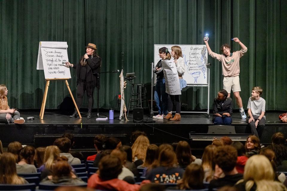 Tennessee Performing Arts Center visiting artist/educator Alison Brazil, left, leads Siegel Humanities Academy students to compose an original song Jan. 25 during Humanities Week at Siegel High School in Murfreesboro. The academy is a partnership between Siegel and MTSU College of Liberal Arts.