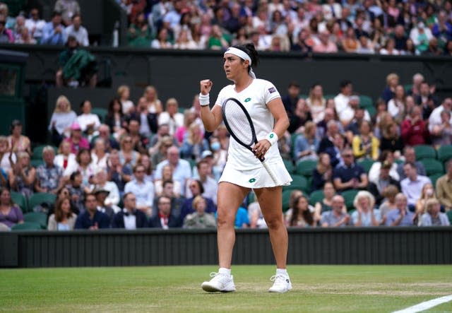 A packed house looks on as Ons Jabeur gestures during her Ladies’ singles match against Aryna Sabalenka