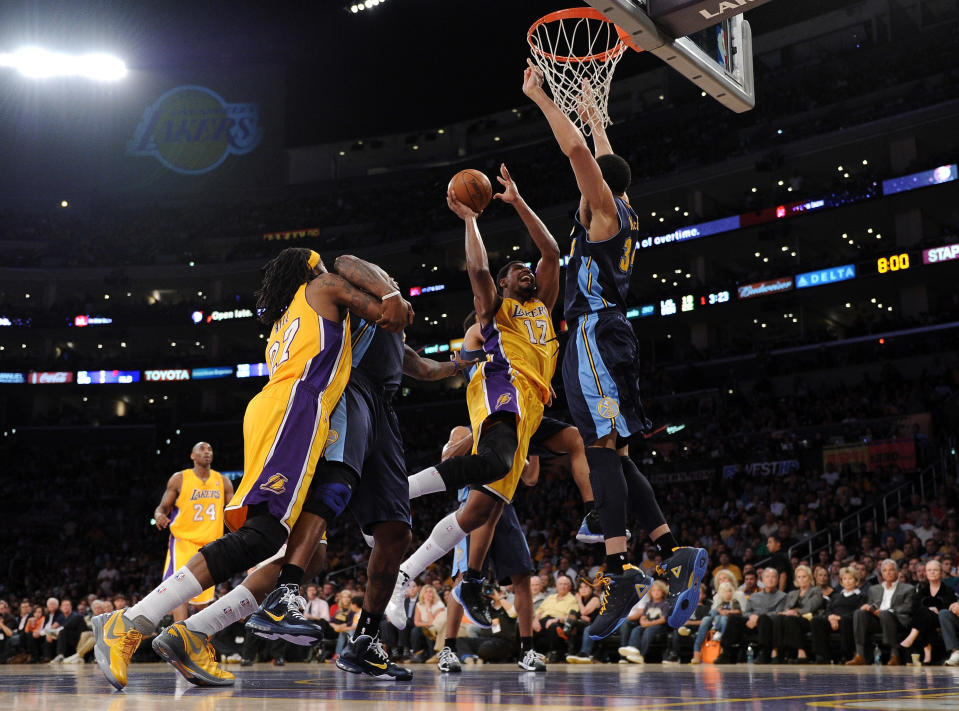 LOS ANGELES, CA - MAY 12: Andrew Bynum #17 of the Los Angeles Lakers goes up for a shot over JaVale McGee #34 of the Denver Nuggets in the first half in Game Seven of the Western Conference Quarterfinals in the 2012 NBA Playoffs on May 12, 2012 at Staples Center in Los Angeles, California. NOTE TO USER: User expressly acknowledges and agrees that, by downloading and or using this photograph, User is consenting to the terms and conditions of the Getty Images License Agreement. (Photo by Harry How/Getty Images)