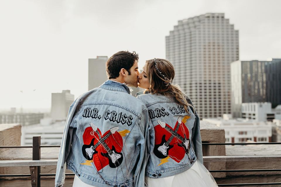 The day of the wedding began with the couple and guests gathering at the Ace Hotel for photos. Here, Darren and Mia pose in their personalized Levi’s jean jackets.