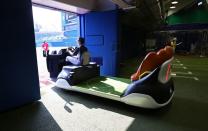 The bullpen cart is driven from the bullpen onto the field at Yokohama Baseball Stadium during the Tokyo 2020 Olympic Games