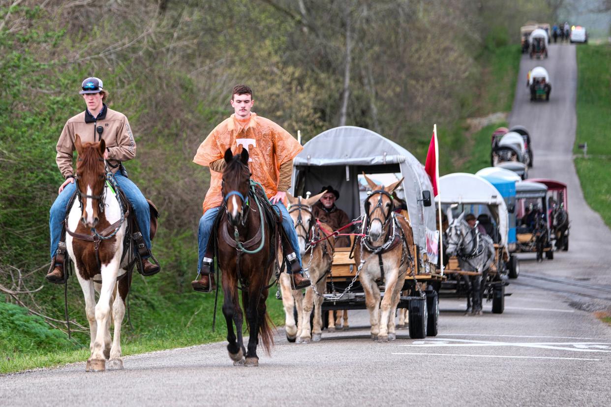 The Mule Day Wagon Train heading down Hick Lane on the way to Maury County Park in Maury County on April 3.