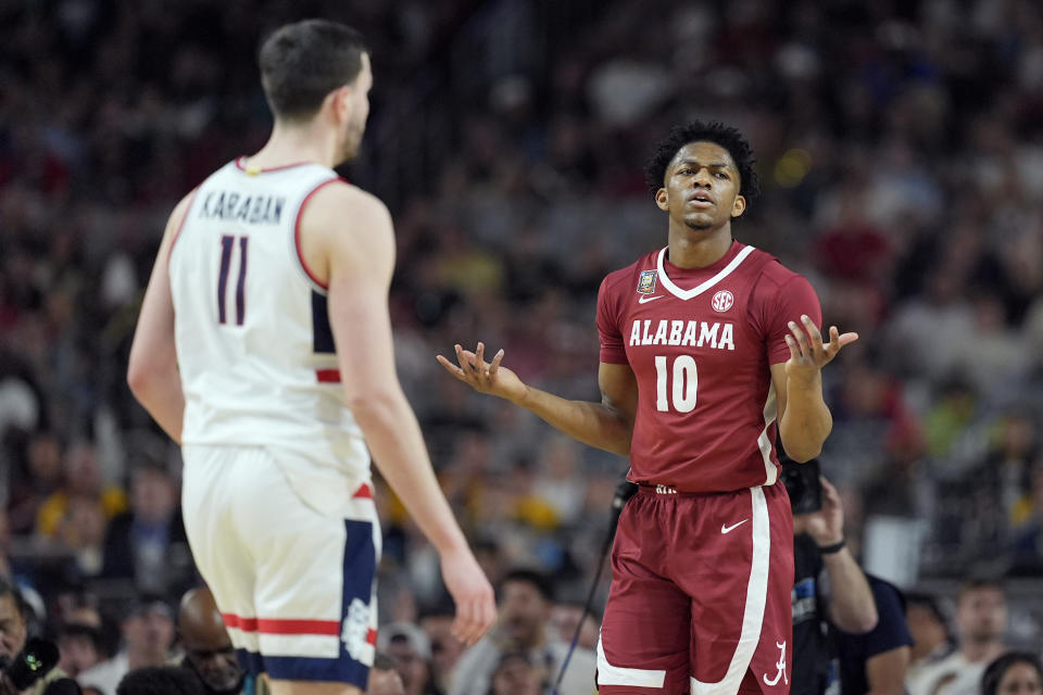Alabama forward Mouhamed Dioubate (10) looks for a call during the second half of the NCAA college basketball game against UConn at the Final Four, Saturday, April 6, 2024, in Glendale, Ariz. (AP Photo/Brynn Anderson )