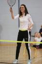 <p><em>February 24, 2016 —</em> Kate wore sneakers and track pants to take part in a tennis workshop with Andy Murray's mother Judy at Craigmount High School in Edinburgh, Scotland.</p>