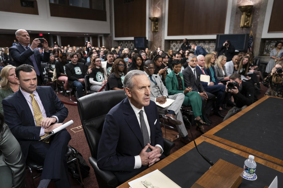 Longtime Starbucks CEO Howard Schultz takes his seat at a crowded Senate Health, Education, Labor and Pensions Committee hearing room where he expects to face sharp questioning about the company's actions during an ongoing unionizing campaign, at the Capitol in Washington, Wednesday, March 29, 2023. (AP Photo/J. Scott Applewhite)