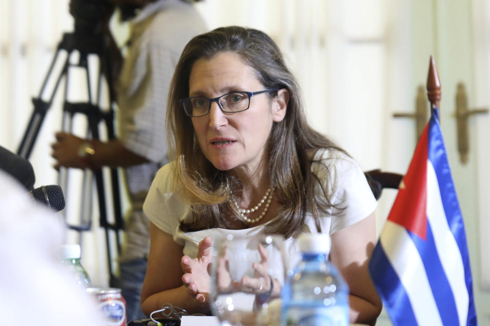 Canada's Foreign Minister Chrystia Freeland speaks with Cuba's foreign minister during a meeting in Havana, Cuba, May 16, 2019. Freeland's office says the purpose of the visit is "to discuss the deteriorating situation" in Cuba's ally Venezuela, as well as tightened U.S. sanctions on Cuba. (Alexandre Meneghini/Pool Photo via AP)