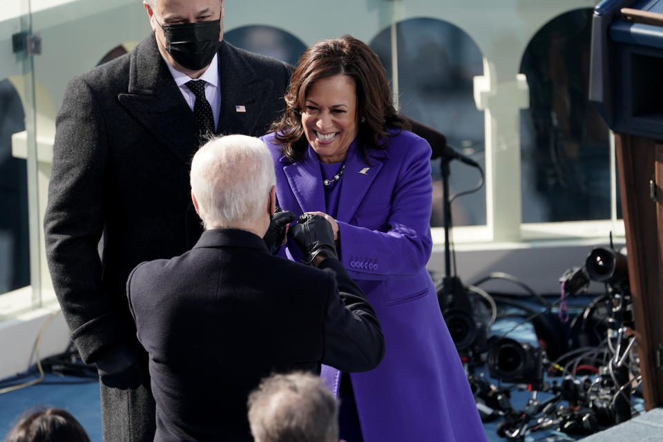 President Joe Biden and Vice President Kamala Harris share a celebratory fist bump at their inauguration in Washington D.C. on Jan. 20, 2021.<span class="copyright">Greg Nash—Pool/Getty Images</span>