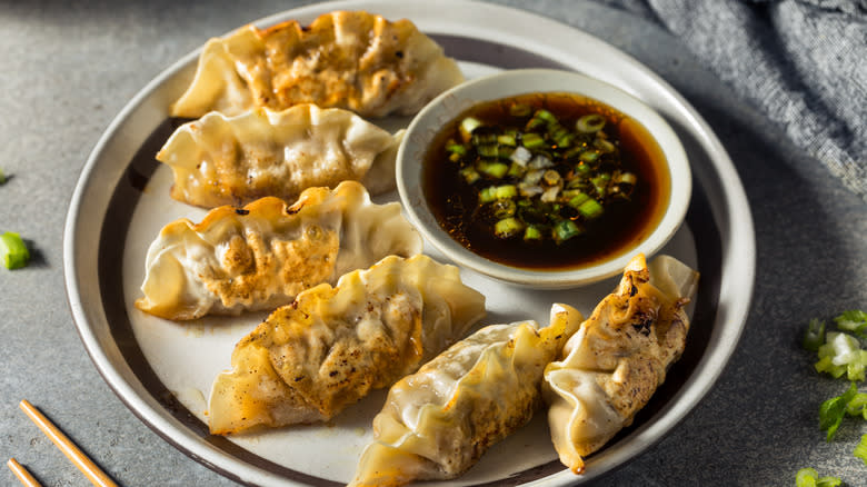 Yangnyeomjang served with dumplings