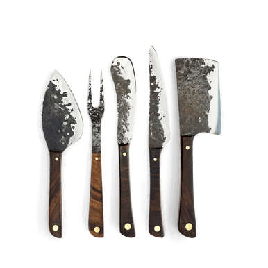 <p><a href="https://www.blackberryfarmshop.com/cheese-knife-set-box/" rel="nofollow noopener" target="_blank" data-ylk="slk:Shop Now;elm:context_link;itc:0;sec:content-canvas" class="link ">Shop Now</a></p><p>Hand Forged Cheese Knife Set</p><p>blackberryfarmshop.com</p>