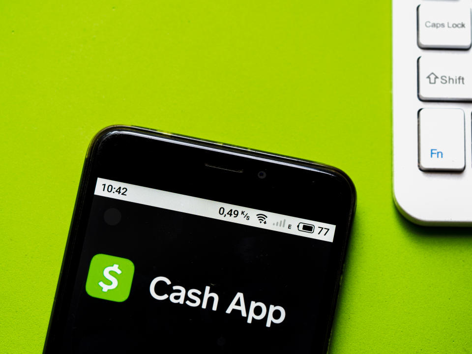 UKRAINE - 2020/10/12: In this photo illustration a Cash App logo seen displayed on a smartphone. (Photo Illustration by Igor Golovniov/SOPA Images/LightRocket via Getty Images)