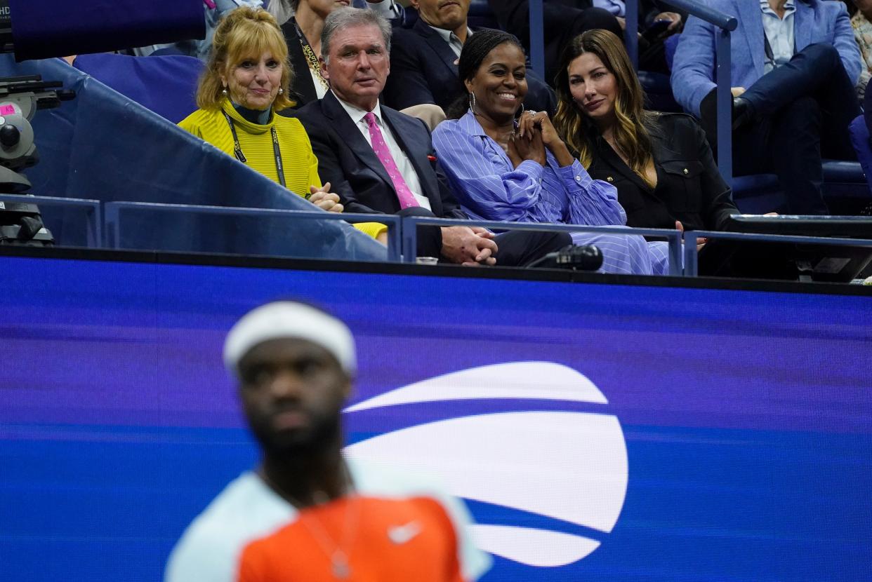 Michelle Obama looks on as Frances Tiafoe competes at the 2022 US Open.