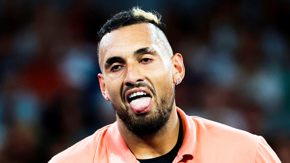 Nick Kyrgios pulls a face after a point against Gilles Simon.