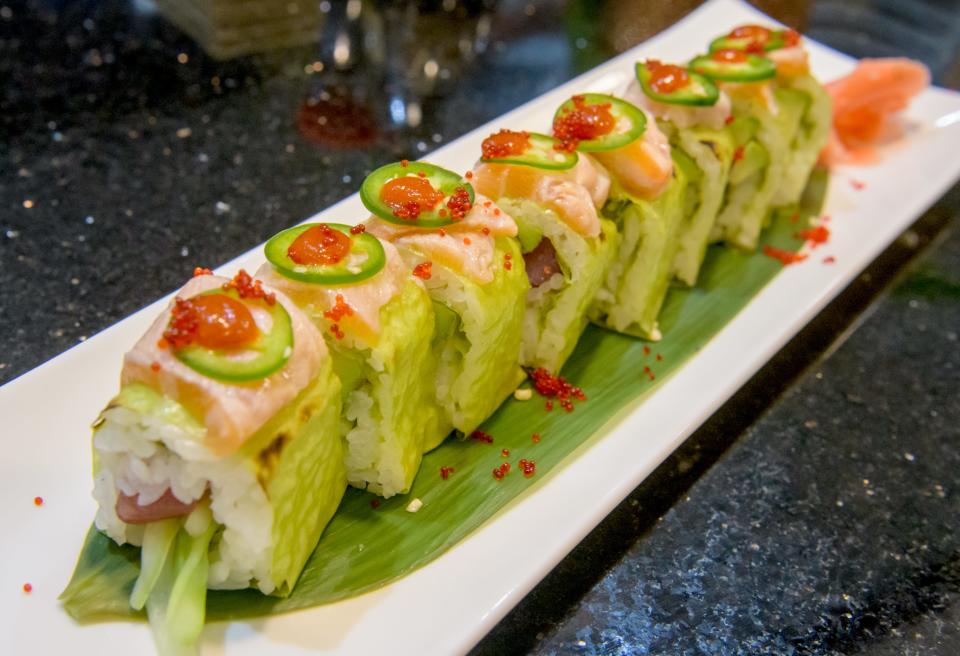 The Mt. Fuji Roll at Oyama Sushi in the Morton Village Shopping Center is a tuna, avocado and cucumber wrap in soybean paper topped with seared salmon, jalapeno, red tobiko and hot sauce.