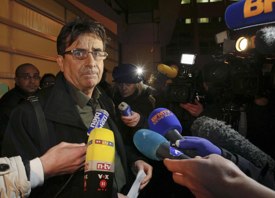 Deputy director Jean Marc Grenier talks to media outside the CHU Nord hospital in Grenoble, French Alps, where retired seven-times Formula One world champion Michael Schumacher is hospitalized after a ski accident, December 29, 2013. Retired seven-times Formula One world champion Michael Schumacher is in 'critical' condition following a fall while skiing off-piste in the French Alps resort of Meribel, according to media reports. The 44-year-old German was wearing a helmet and was conscious while being transported to a local hospital before later being transferred to to a better-equipped medical unit in Grenoble for further examinations. (REUTERS/Robert Pratta)