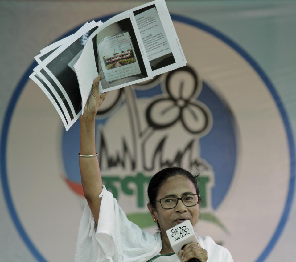 Trinamool Congress leader and Chief Minister of West Bengal state Mamata Banerjee addresses an election rally at Anchana in Mathurapur, about 60 kilometers south of Kolkata, India, Thursday, May 16, 2019. With 900 million of India's 1.3 billion people registered to vote, the Indian national election is the world's largest democratic exercise. The seventh and last phase of the elections will be held on Sunday. (AP Photo/Bikas Das)