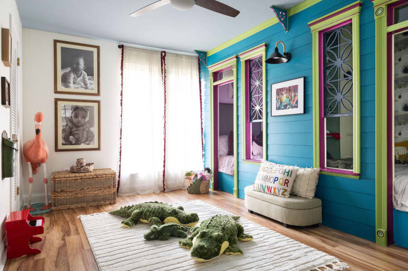 Turquoise and green kids room with 2 separate bed nooks