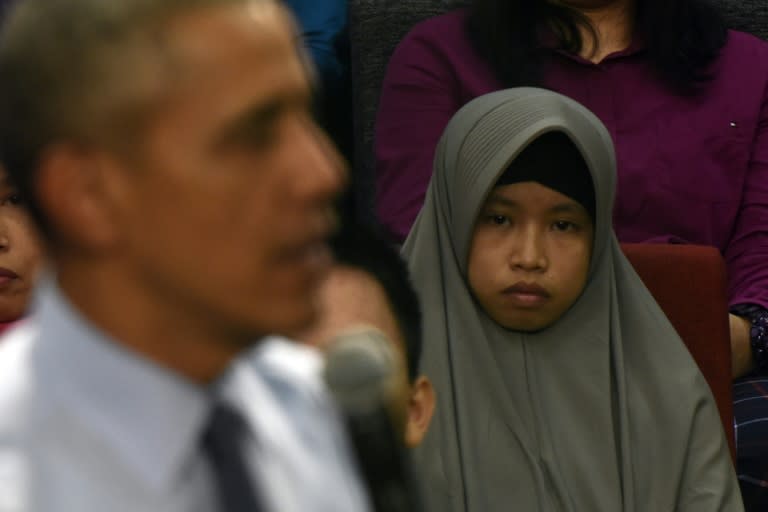 A woman looks on as US President Barack Obama takes questions from the Young Southeast Asia Leaders Initiative in Kuala Lumpur on November 20, 2015