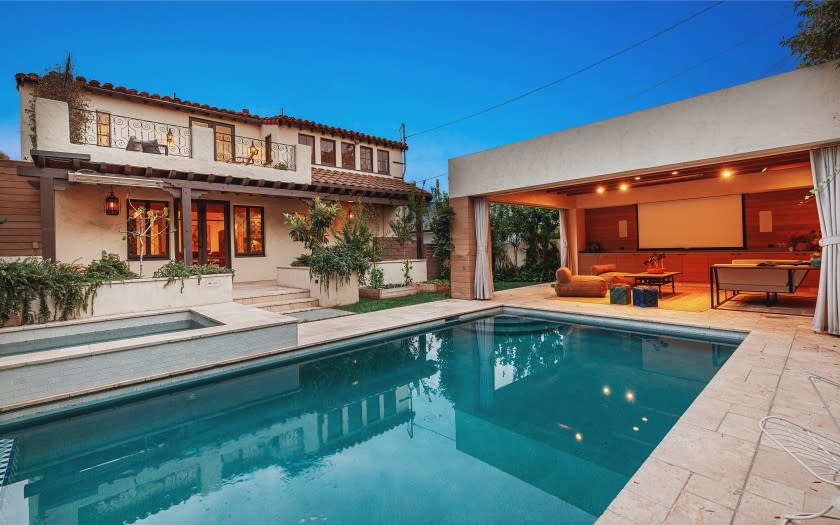 Built in 1932, the designer-done home includes a stylish backyard with a swimming pool and cabana surrounded by vegetable gardens and fruit trees.