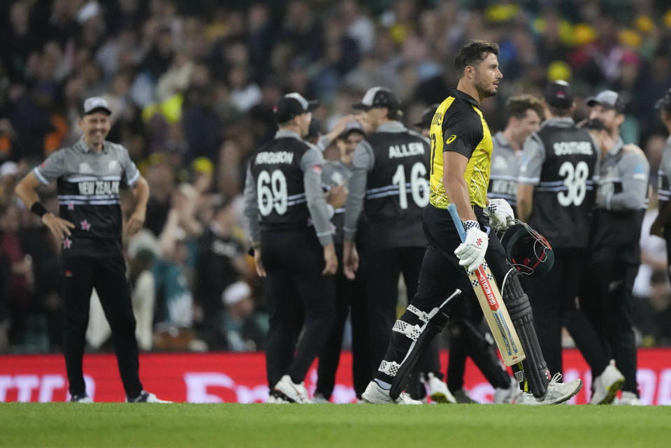 Australia's Marcus Stoinis walks from the field after he was dismissed during the T20 World Cup cricket match between Australia and New Zealand in Sydney, Australia, Saturday, Oct. 22, 2022. (AP Photo/Rick Rycroft)