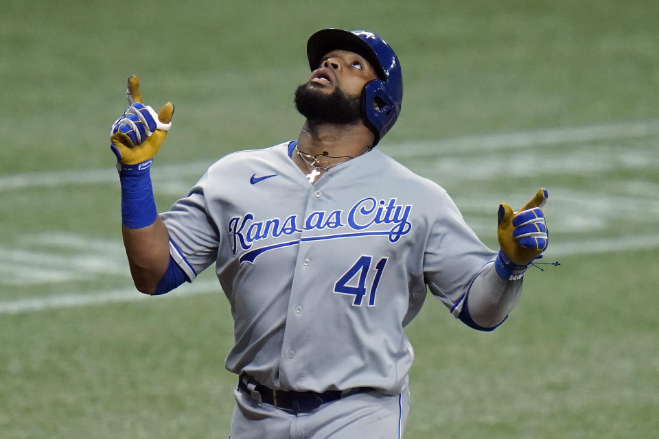 Kansas City Royals' Carlos Santana celebrates his solo home run off Tampa Bay Rays starting pitcher Rich Hill during the fourth inning of a baseball game Tuesday, May 25, 2021, in St. Petersburg, Fla. (AP Photo/Chris O'Meara)