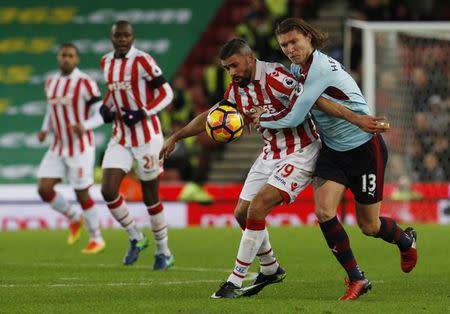 Britain Football Soccer - Stoke City v Burnley - Premier League - bet365 Stadium - 3/12/16 Stoke City's Jonathan Walters in action with Burnley's Jeff Hendrick Action Images via Reuters / Craig Brough Livepic