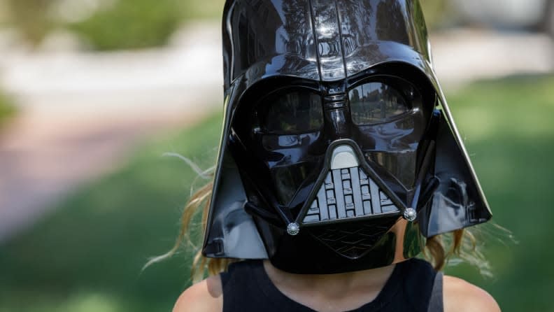 The Darth Vader mask changes a child's voice to mimic the spooky sound of the Dark Lord.