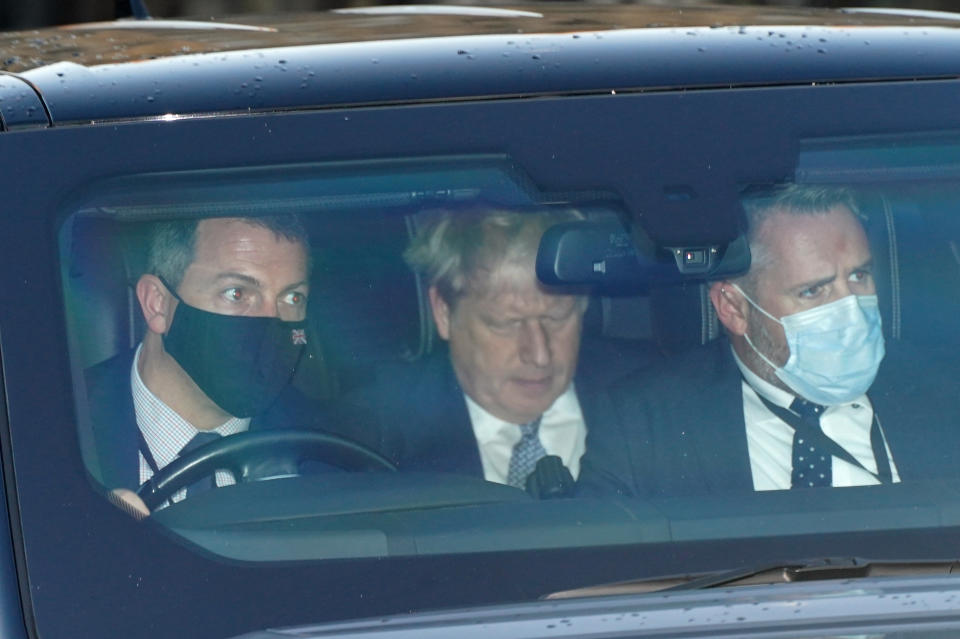 Prime Minister Boris Johnson (centre) leaves Houses of Parliament in Westminster, London, as public anger continues following the leak on Monday of an email from the Prime Minister's principal private secretary Martin Reynolds inviting 100 Downing Street staff to a 